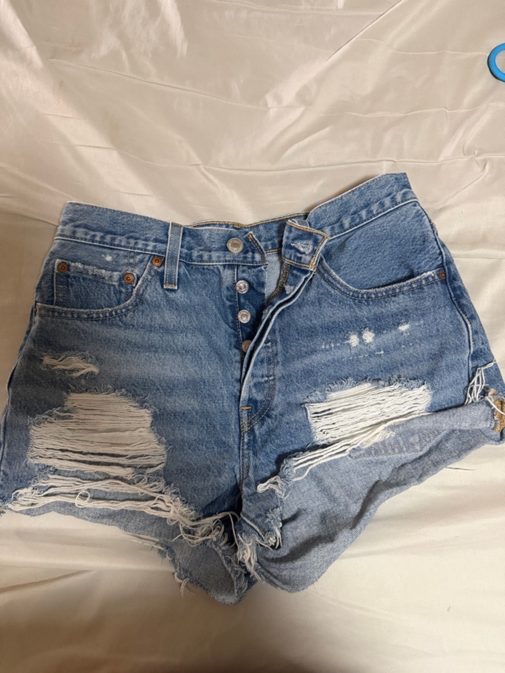 High-Rise Distressed Jean Shorts in Light Blue
